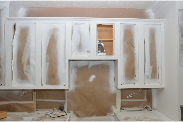 Painting Cabinets white with covered areas not to be painted